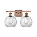 Athens Bath Vanity Light shown in the Antique Copper finish with a Clear shade