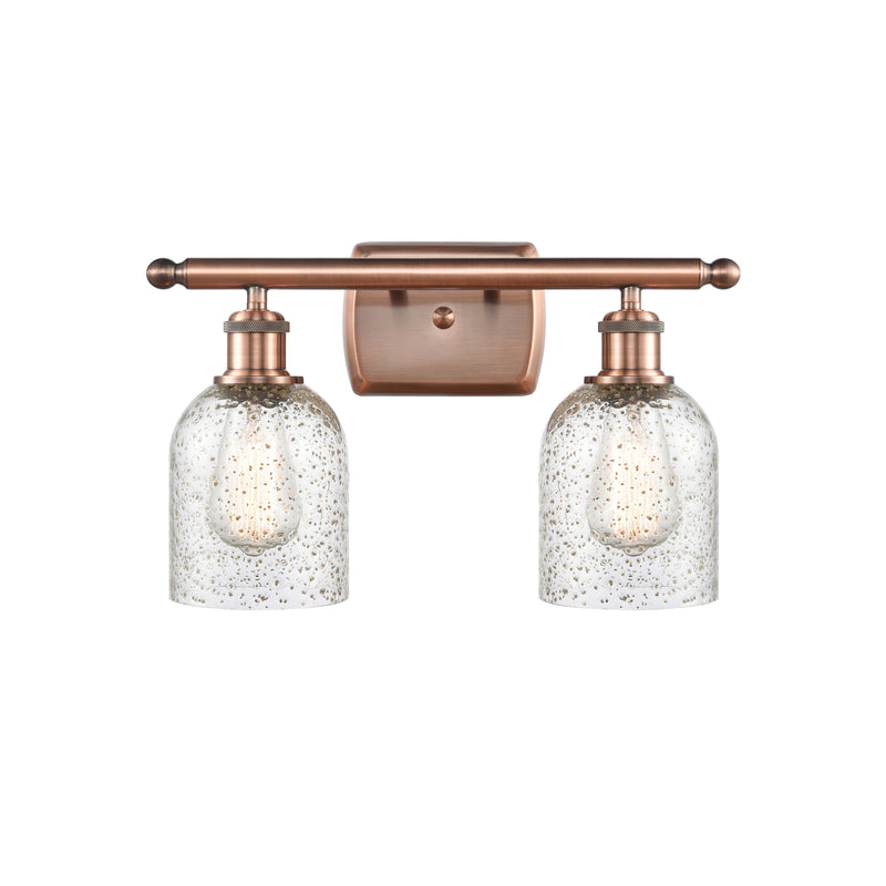 Caledonia Bath Vanity Light shown in the Antique Copper finish with a Mica shade