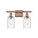 Candor Bath Vanity Light shown in the Antique Copper finish with a Clear Waterglass shade