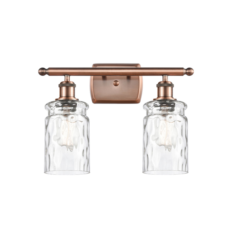 Candor Bath Vanity Light shown in the Antique Copper finish with a Clear Waterglass shade