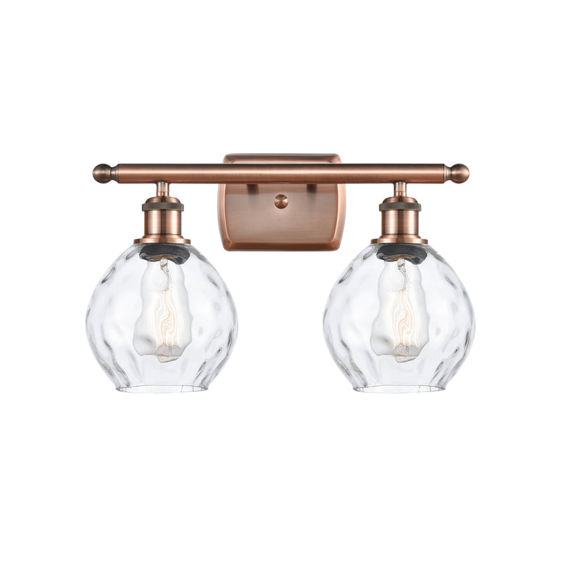 Waverly Bath Vanity Light shown in the Antique Copper finish with a Clear shade