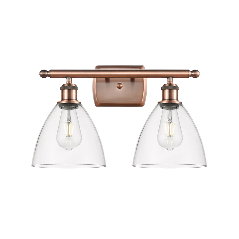 Ballston Dome Bath Vanity Light shown in the Antique Copper finish with a Clear shade