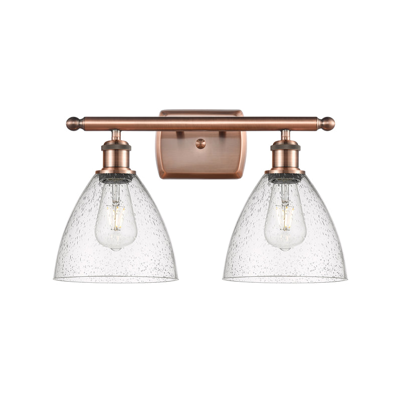 Ballston Dome Bath Vanity Light shown in the Antique Copper finish with a Seedy shade