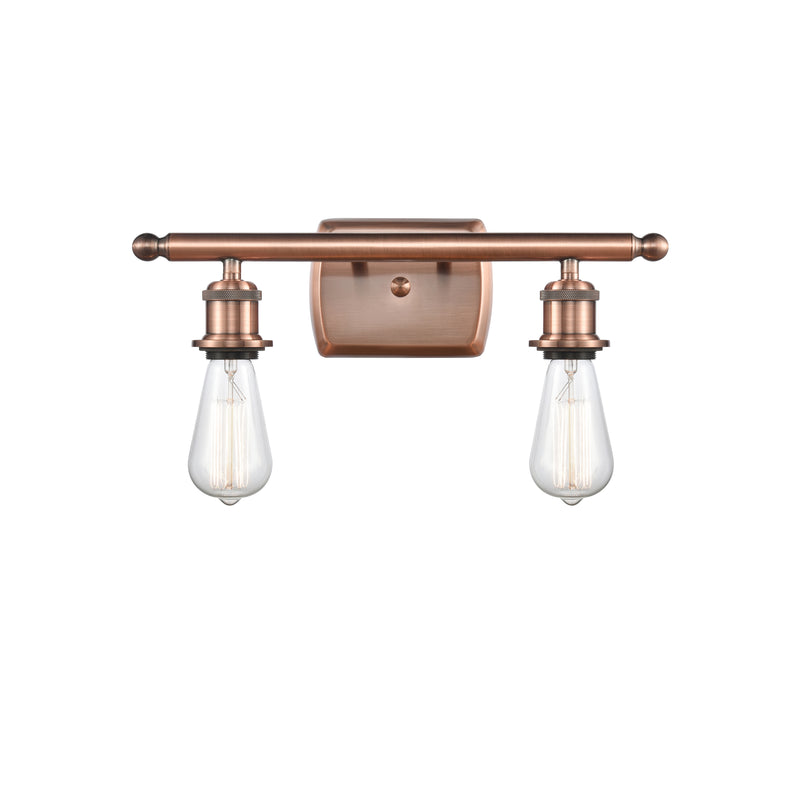 Bare Bulb Bath Vanity Light shown in the Antique Copper finish