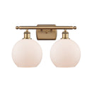 Athens Bath Vanity Light shown in the Brushed Brass finish with a Matte White shade