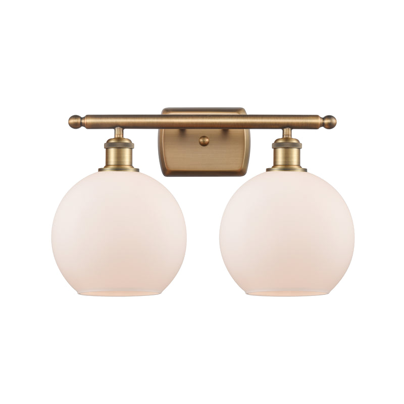 Athens Bath Vanity Light shown in the Brushed Brass finish with a Matte White shade