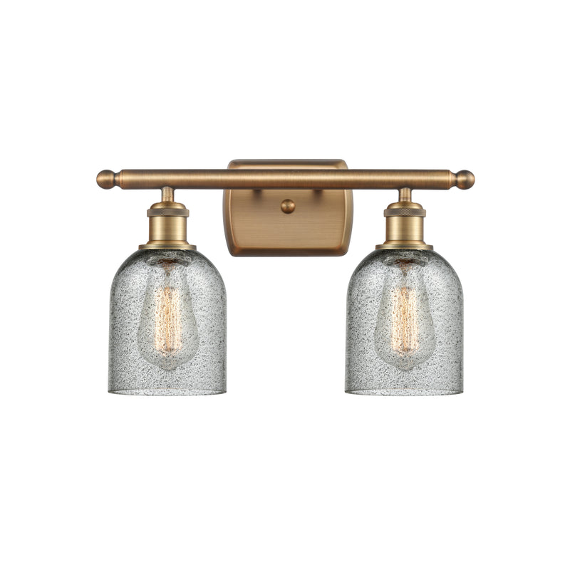 Caledonia Bath Vanity Light shown in the Brushed Brass finish with a Charcoal shade