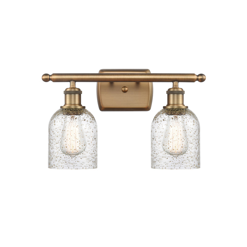 Caledonia Bath Vanity Light shown in the Brushed Brass finish with a Mica shade