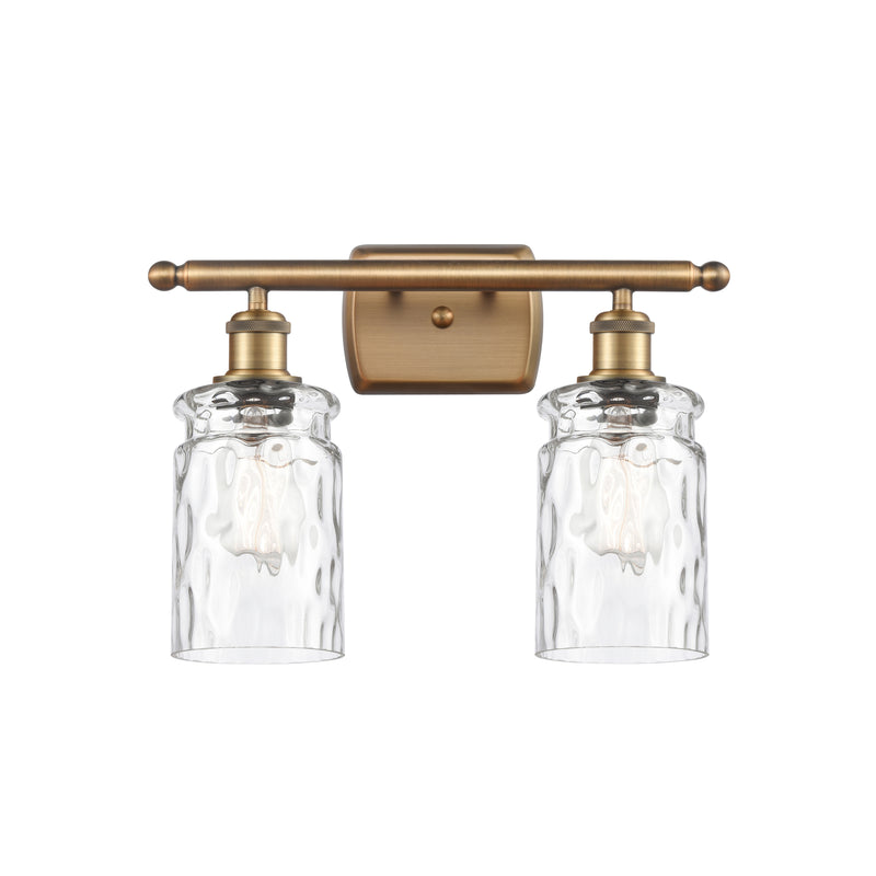 Candor Bath Vanity Light shown in the Brushed Brass finish with a Clear Waterglass shade