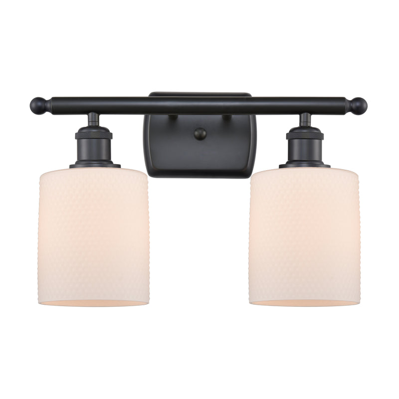 Cobbleskill Bath Vanity Light shown in the Matte Black finish with a Matte White shade