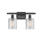 Cobbleskill Bath Vanity Light shown in the Matte Black finish with a Clear shade