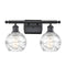 Deco Swirl Bath Vanity Light shown in the Matte Black finish with a Clear shade