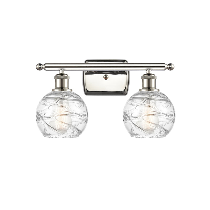 Deco Swirl Bath Vanity Light shown in the Polished Nickel finish with a Clear shade