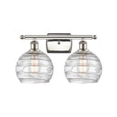 Deco Swirl Bath Vanity Light shown in the Polished Nickel finish with a Clear shade