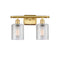 Cobbleskill Bath Vanity Light shown in the Satin Gold finish with a Clear shade