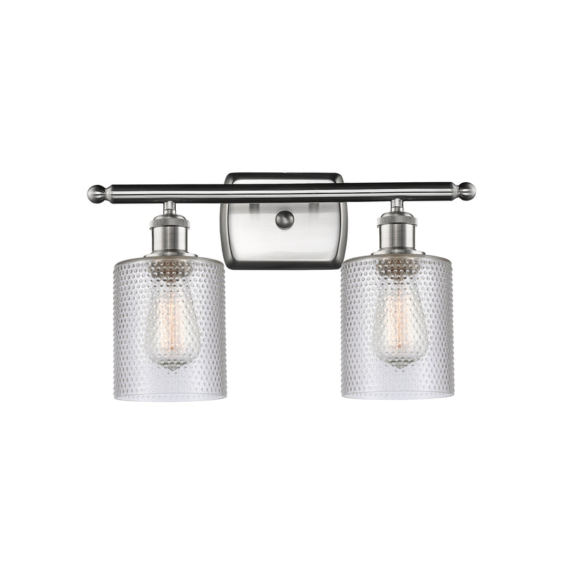 Cobbleskill Bath Vanity Light shown in the Brushed Satin Nickel finish with a Clear shade