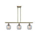 Belfast Island Light shown in the Antique Brass finish with a Seedy shade