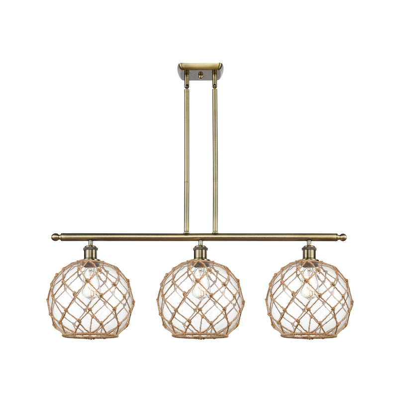 Farmhouse Rope Island Light shown in the Antique Brass finish with a Clear Glass with Brown Rope shade