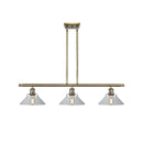 Orwell Island Light shown in the Antique Brass finish with a Clear shade