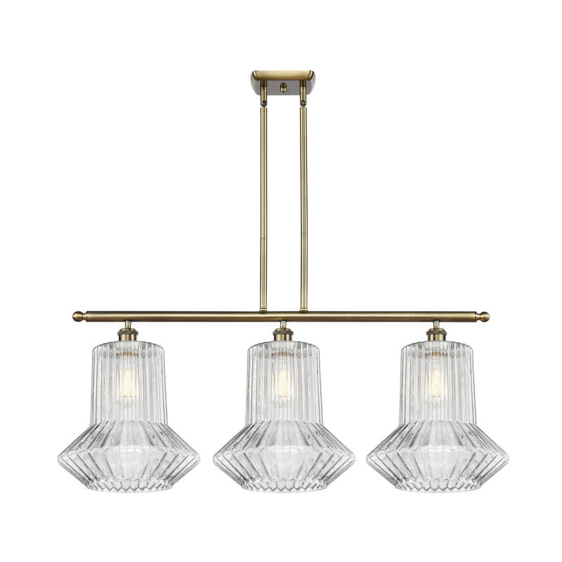 Springwater Island Light shown in the Antique Brass finish with a Clear Spiral Fluted shade