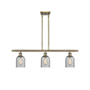 Caledonia Island Light shown in the Antique Brass finish with a Charcoal shade