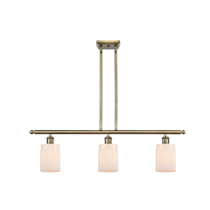 Hadley Island Light shown in the Antique Brass finish with a Matte White shade