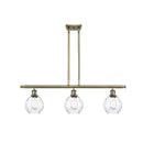 Waverly Island Light shown in the Antique Brass finish with a Clear shade