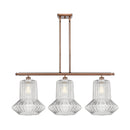 Springwater Island Light shown in the Antique Copper finish with a Clear Spiral Fluted shade