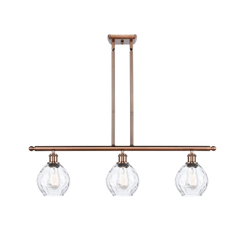 Waverly Island Light shown in the Antique Copper finish with a Clear shade