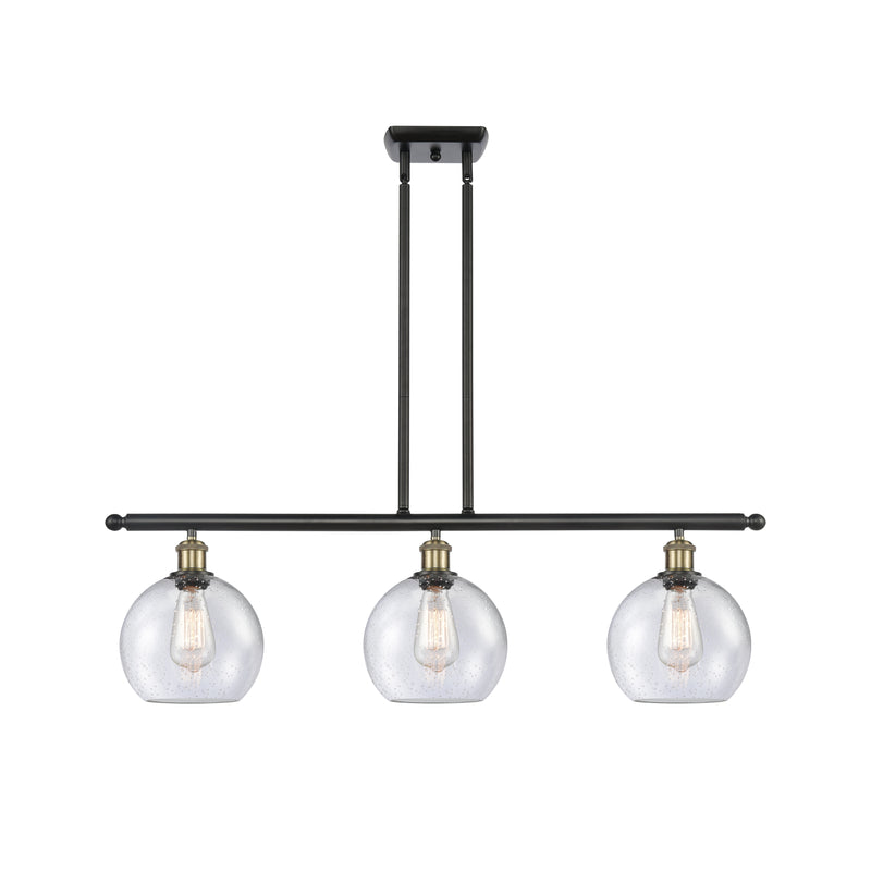 Athens Island Light shown in the Black Antique Brass finish with a Seedy shade