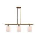 Cobbleskill Island Light shown in the Brushed Brass finish with a Matte White shade