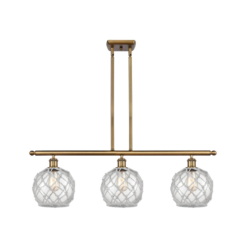 Farmhouse Rope Island Light shown in the Brushed Brass finish with a Clear Glass with White Rope shade