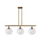 Athens Island Light shown in the Brushed Brass finish with a Seedy shade