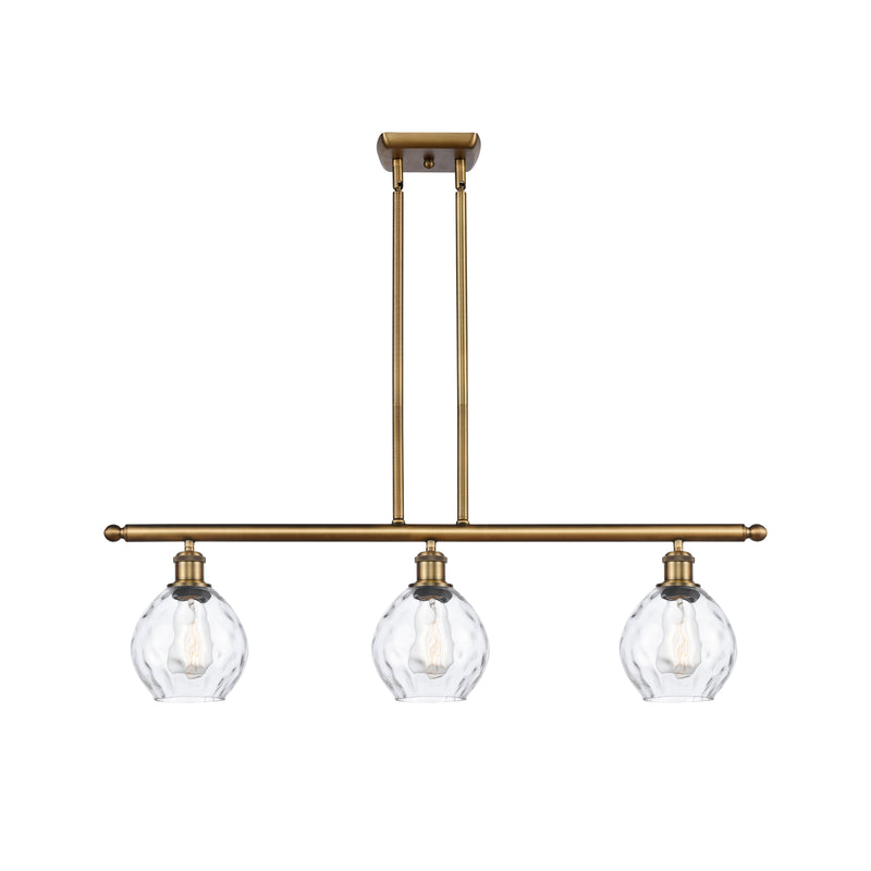 Waverly Island Light shown in the Brushed Brass finish with a Clear shade