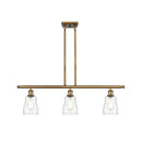 Ellery Island Light shown in the Brushed Brass finish with a Clear shade