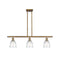 Brookfield Island Light shown in the Brushed Brass finish with a Clear shade