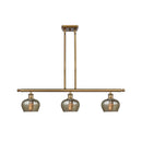 Fenton Island Light shown in the Brushed Brass finish with a Mercury shade