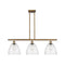 Ballston Dome Island Light shown in the Brushed Brass finish with a Seedy shade