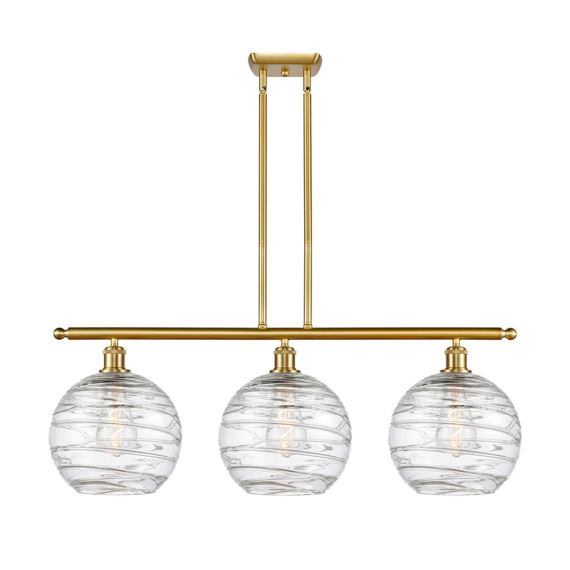 Deco Swirl Island Light shown in the Satin Gold finish with a Clear shade