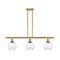 Waverly Island Light shown in the Satin Gold finish with a Clear shade