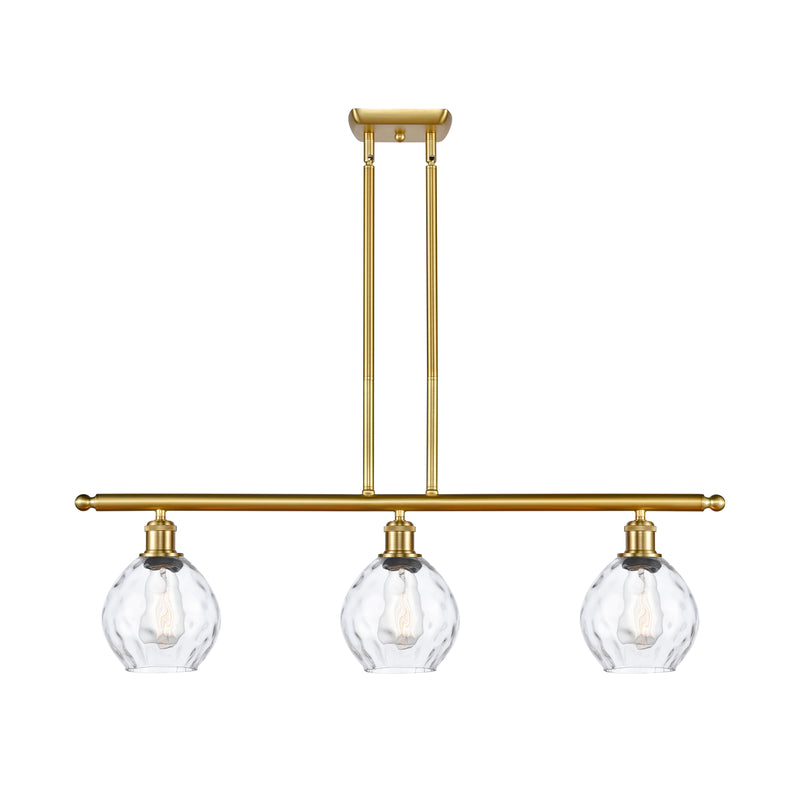 Waverly Island Light shown in the Satin Gold finish with a Clear shade