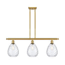 Waverly Island Light shown in the Satin Gold finish with a Clear shade