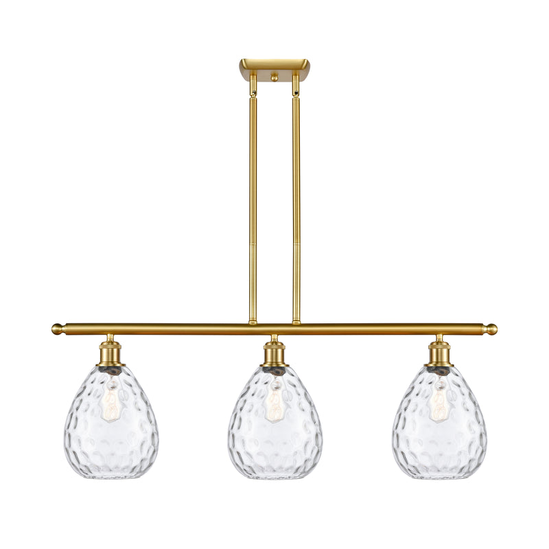 Waverly Island Light shown in the Satin Gold finish with a Clear shade