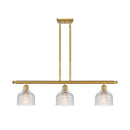 Dayton Island Light shown in the Satin Gold finish with a Clear shade