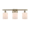 Cobbleskill Bath Vanity Light shown in the Antique Brass finish with a Matte White shade