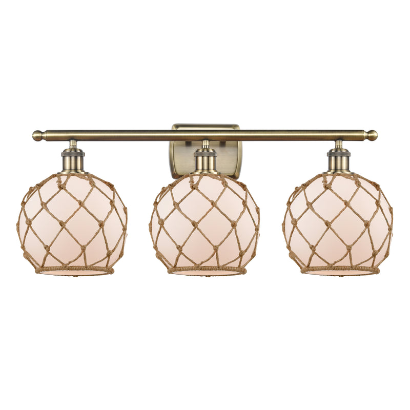 Farmhouse Rope Bath Vanity Light shown in the Antique Brass finish with a White Glass with Brown Rope shade