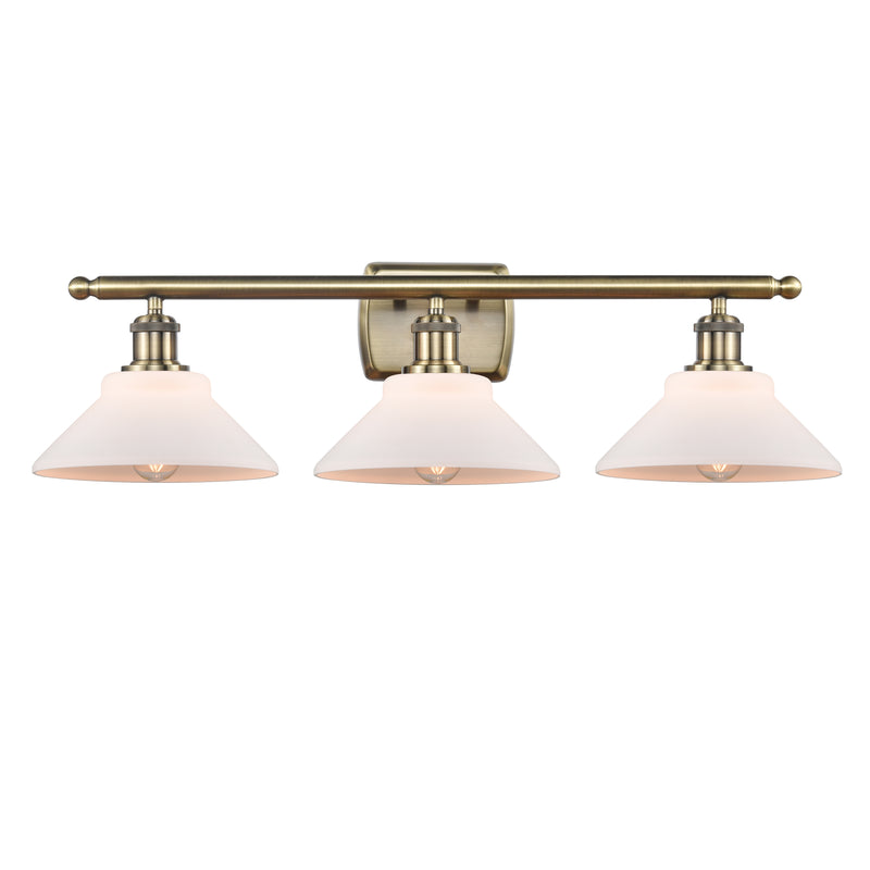 Orwell Bath Vanity Light shown in the Antique Brass finish with a Matte White shade