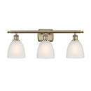 Castile Bath Vanity Light shown in the Antique Brass finish with a White shade