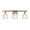 Dayton Bath Vanity Light shown in the Antique Brass finish with a White shade