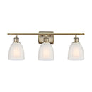 Brookfield Bath Vanity Light shown in the Antique Brass finish with a White shade